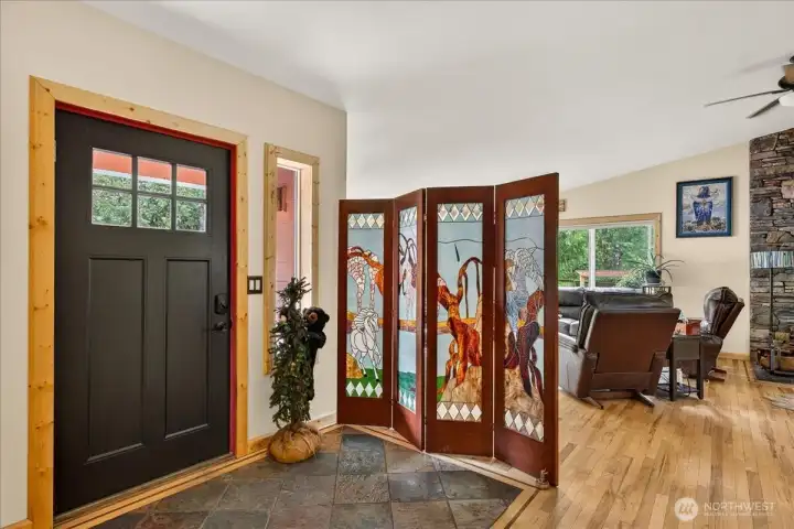 Welcoming entry way into this lovely custom built 3+ bedroom, 2 bath home thoughtfully situated on 4.630 acres in sought after Conway area.