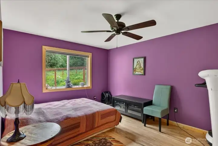 Bedroom 3 - Guest bedroom at the end of the hallway that overlooks the side yard and garden.