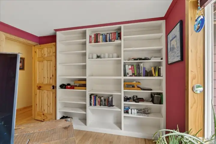 Wall of built-in's located in the bonus room that is currently being used as a home office.
