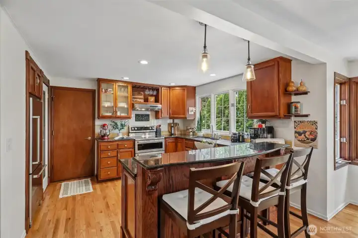 Large kitchen with stainless steel appliances
