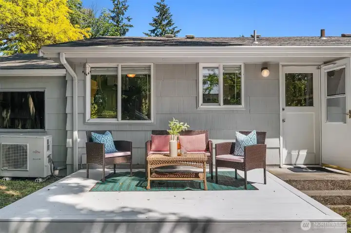 The backyard is expansive.  With mature trees and space to make all your gardening dreams come true.  The deck is just off the kitchen for al fresco dining.