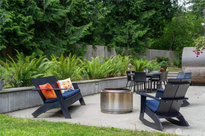 Fenced in back yard with  850 sqft hardscape patio