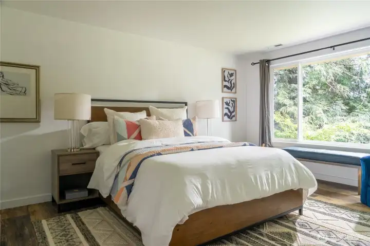 Primary suite with peek view of the water