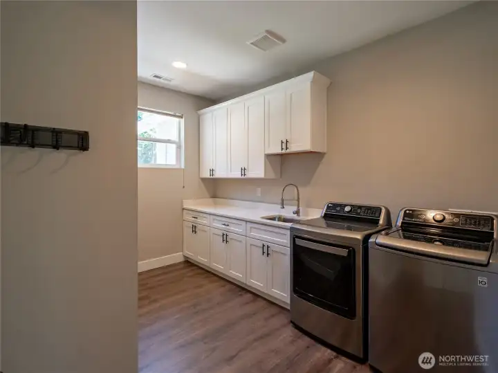 Spacious Laundry room with washer & dryer. Spacious Laundry room with washer & dryer.