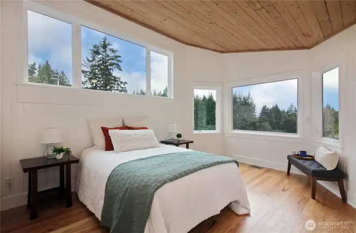 Upstairs primary suite with 3/4 bath attached.  Big blue sky views!