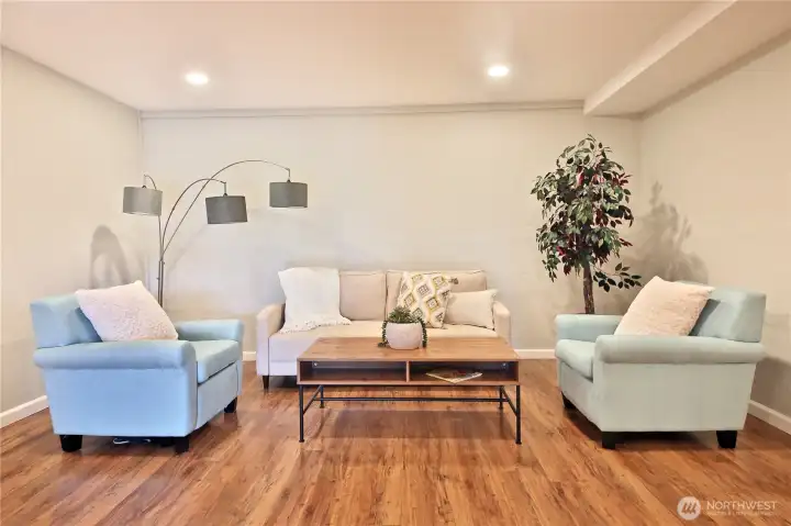 Daylight basement quarters with large living space.