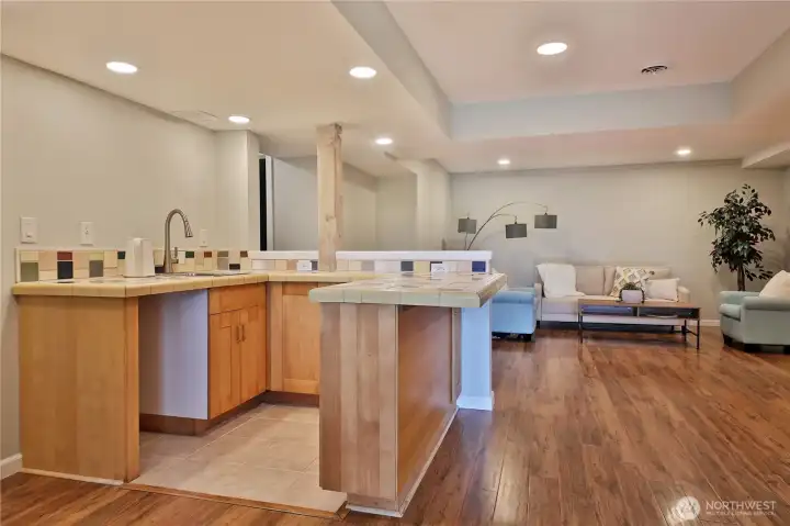Studio kitchenette has outlet for 30" oven.  Multigenerational living space or flex quarters, the choice is yours!