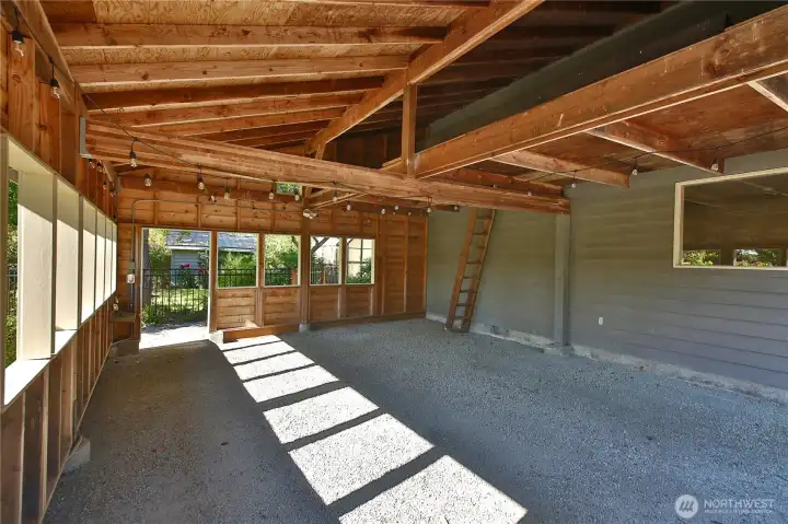 Carport off shop.