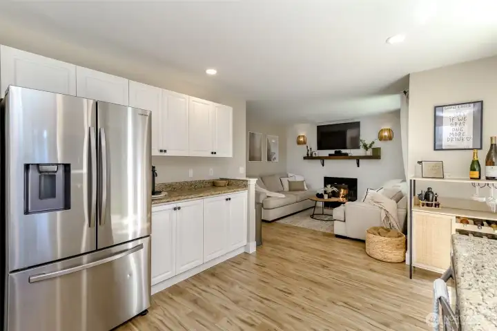Kitchen to family room and cozy fireplace Kitchen to family room and cozy fireplace