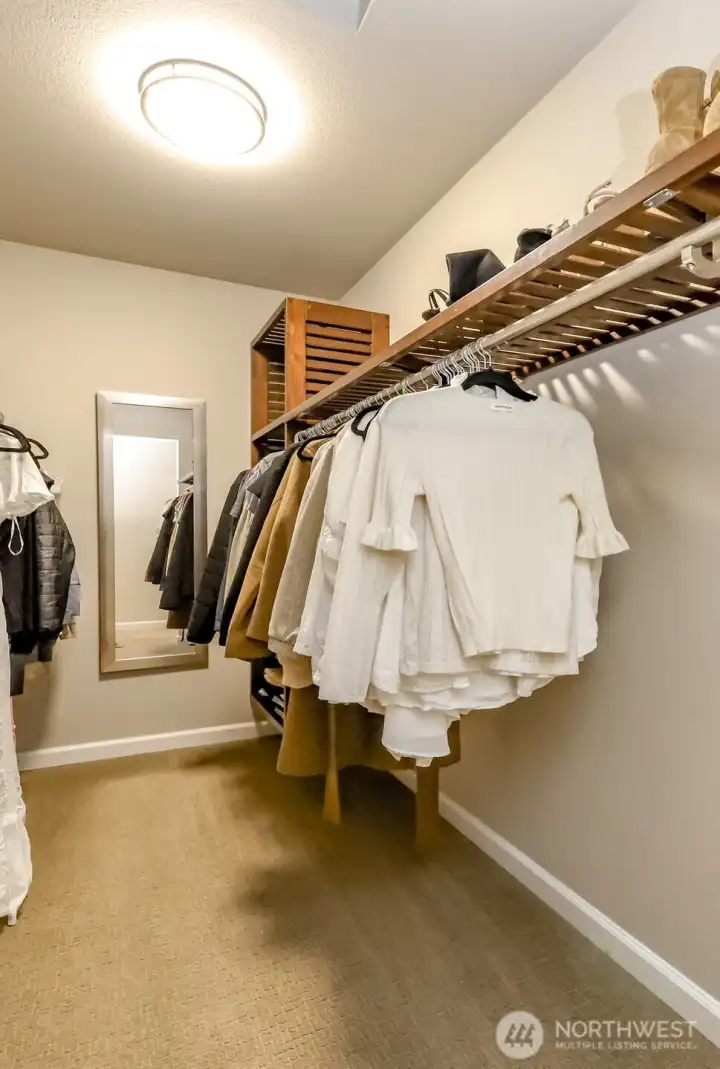 Primary walk in closet Primary walk in closet