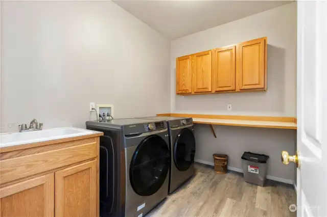 Large Utility room with wash basin on the main level