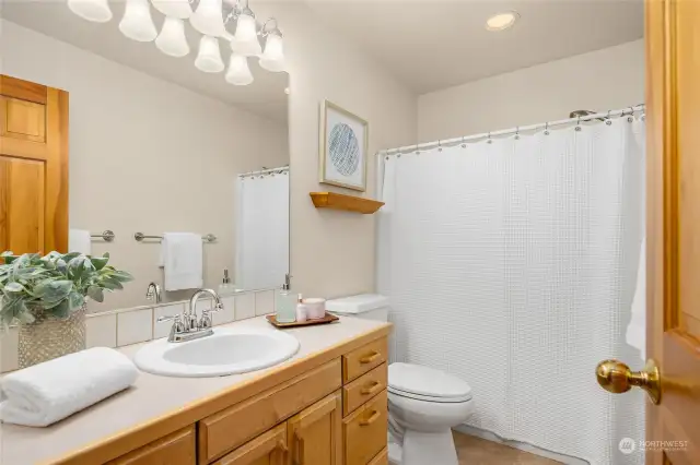 The second story shared bath has a tub/shower combination.