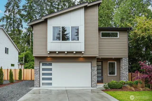 Welcome to this spectacular new  construction home that's nearing completion,  where every detail has been thoughtfully  designed for comfort, luxury, and versatility.