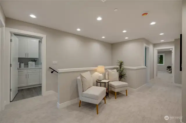Plush, luxury carpeting upstairs adds a soft,  comfortable touch to the sleeping quarters.