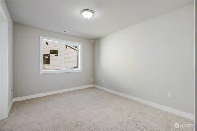 Each of the remaining four bedrooms is equally impressive, with walk-in closets that provide generous storage.