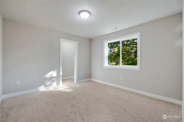 Each of the remaining four bedrooms is equally impressive, with walk-in closets that provide generous storage.