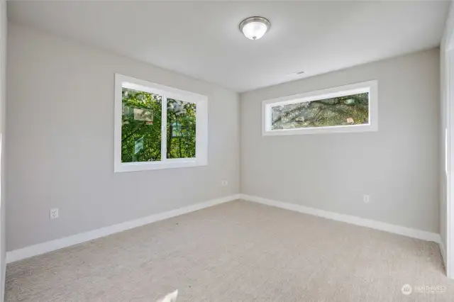 Each of the remaining four bedrooms is equally impressive, with walk-in closets that provide generous storage.