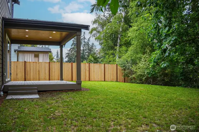 Step outside and enjoy the spacious covered  back deck, perfect for outdoor dining,  relaxation, or simply enjoying the fresh air.