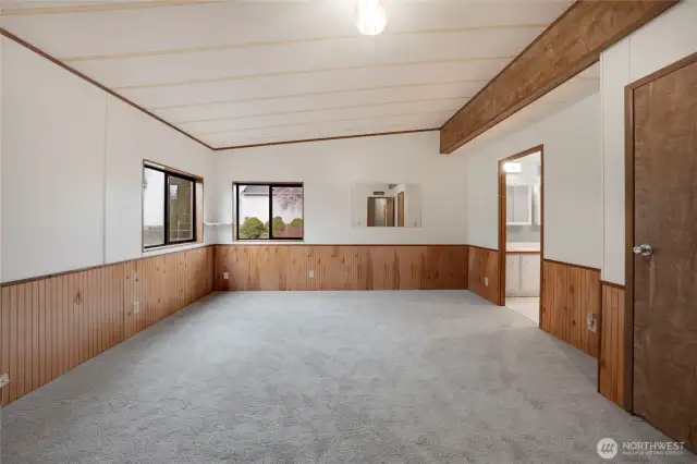 The spacious Primary Bedroom also has a walk-in closet and bathroom.