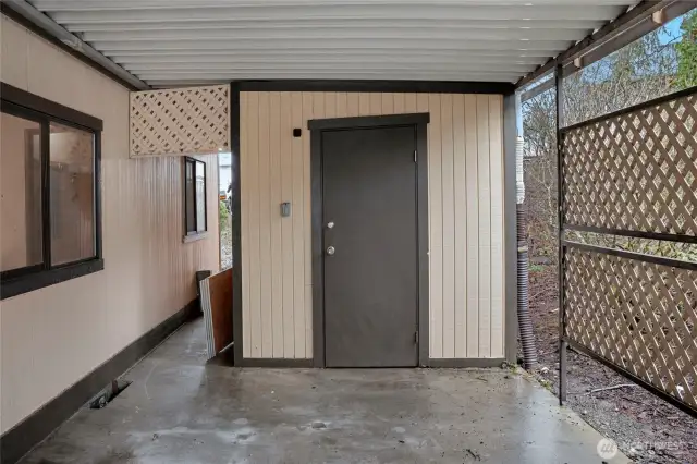 At the end of the carport is a spacious storage area!