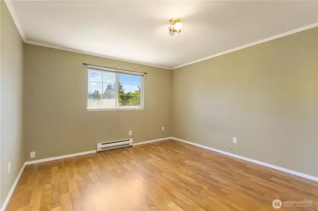 upstairs primary bedroom with attached bathroom