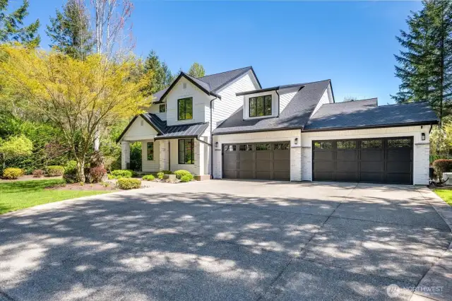 Curb appealing for sure; private drive; 4 car, newest paint scheme