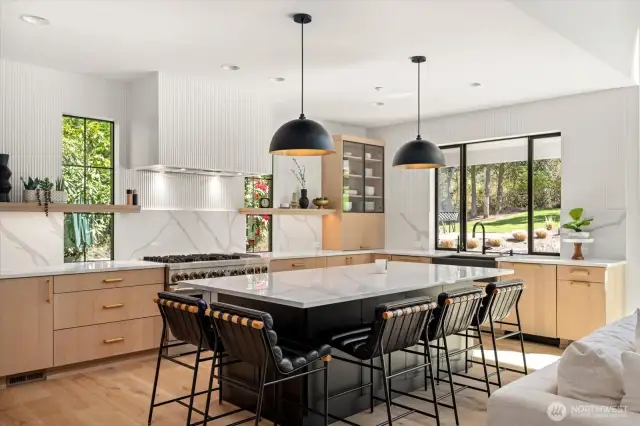 Extended informal eating area, a crowd favorite; adjoins kitchen w/excessive counter space and cabinetry.