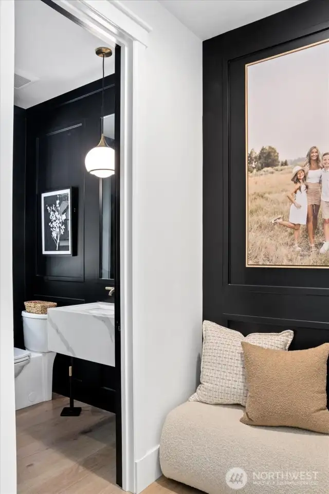 Entrance greeting niche w/access to powder room