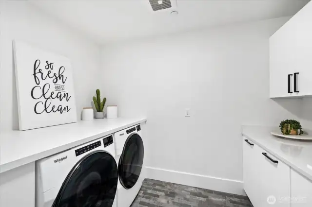 Here's the other laundry room; lots of cabinetry; and you won't mind folding clothes here. Undercounter w/d.