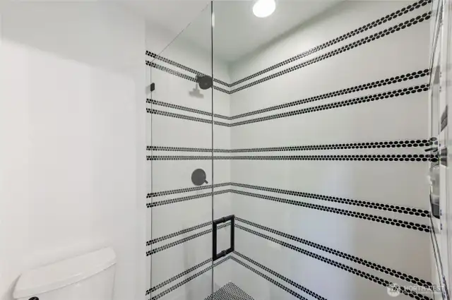 Upstairs adj shower space; statements made in black and white.