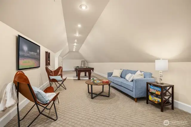 Large flex room above the garage.  Would make a great Media room or ??