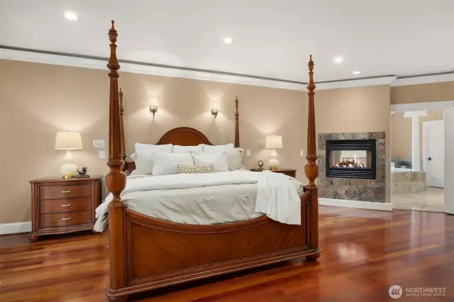 See through fireplace to be enjoyed from the jacuzzi tub or while lounging in bed