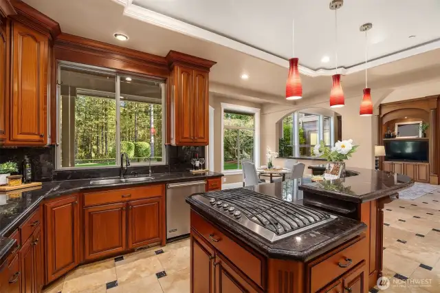 Well Designed Kitchen with chefs Island, Custom Cabinetry abundant storage and viking appliances