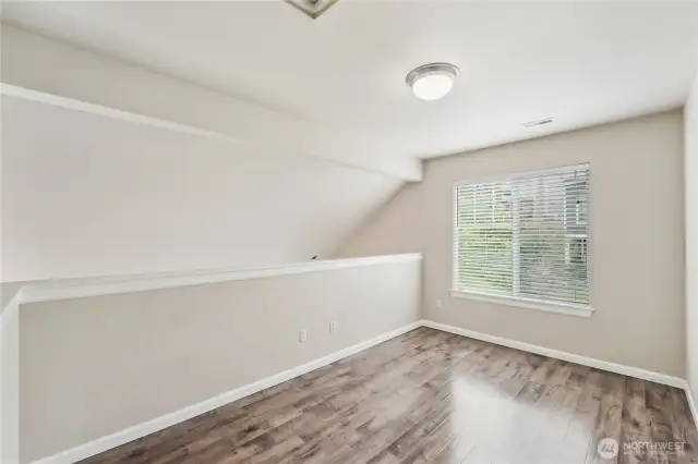 Bonus loft is perfect for an office. playroom or media space.