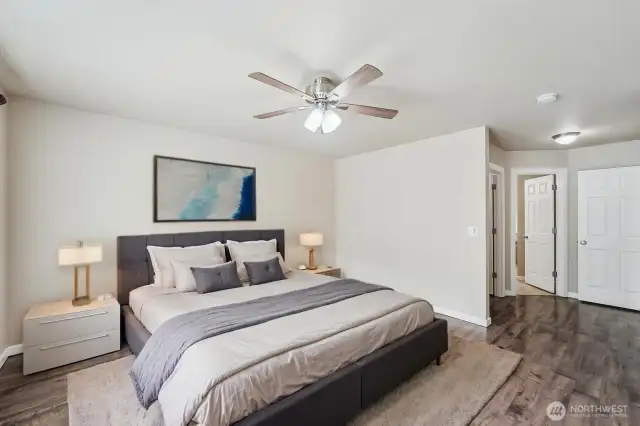 Primary suite features a large walk-in closet and spacious en suite.