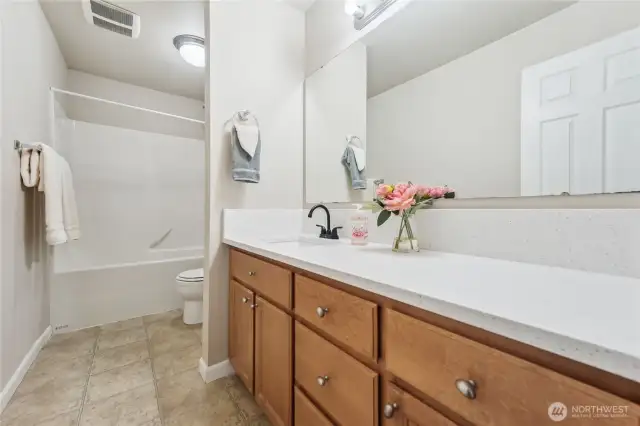 Main bath on upper level.