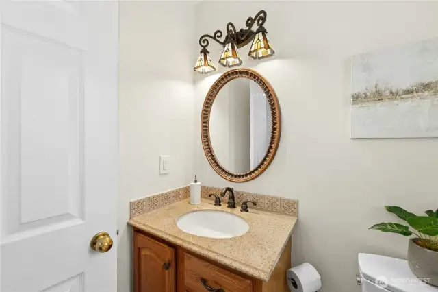 A very pretty powder room on the main level...