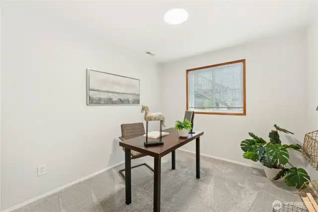 This is the 3rd bedroom and staged as that perfect office for those who often work from home!