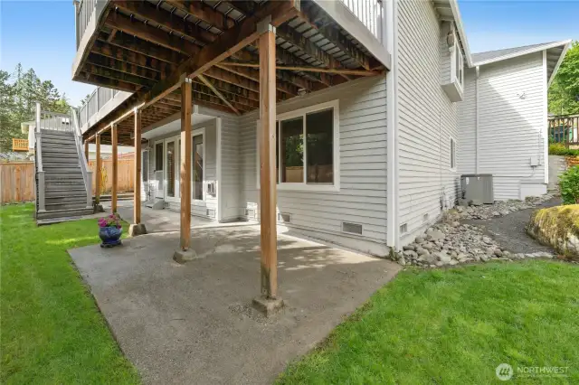 A back-yard view with easy access from the upper deck and both side yards!