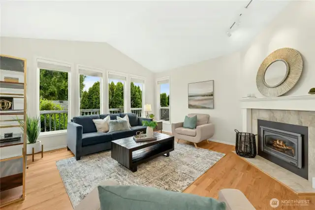 Living room - complete with a gas fireplace and refinished, gleaming  hardwood floors!