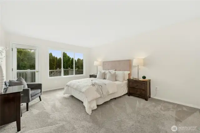 Welcome to the Primary bedroom en suite with access to the upper deck! So much natural light!