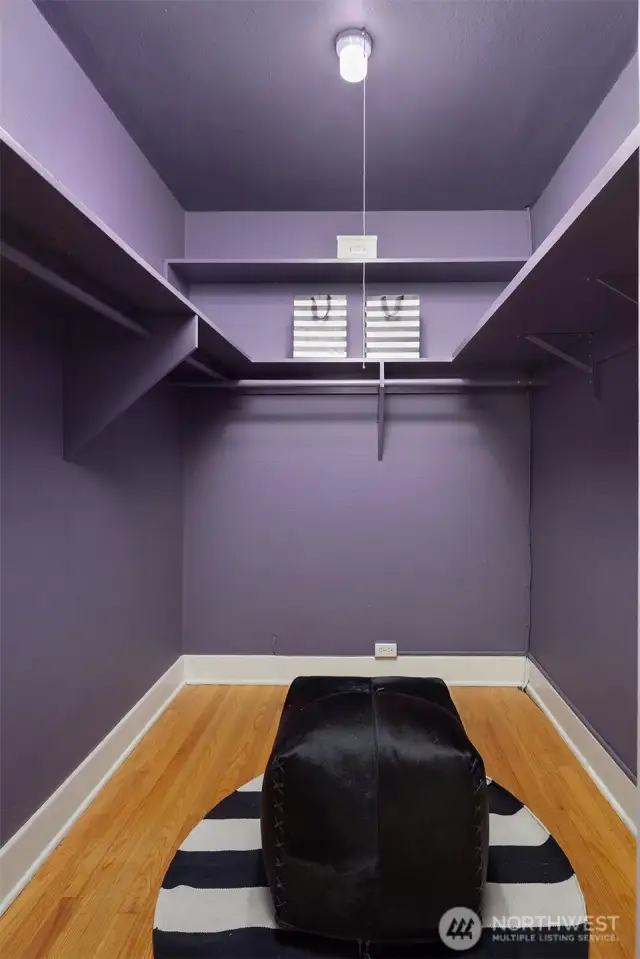 The second and larger of the two walk-in closets--perfect for a work from home office!
