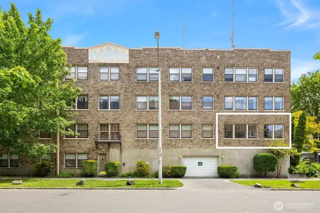 An exterior photo of the location of #111. Note that it's located up off the street even though it's on the first floor of the building.