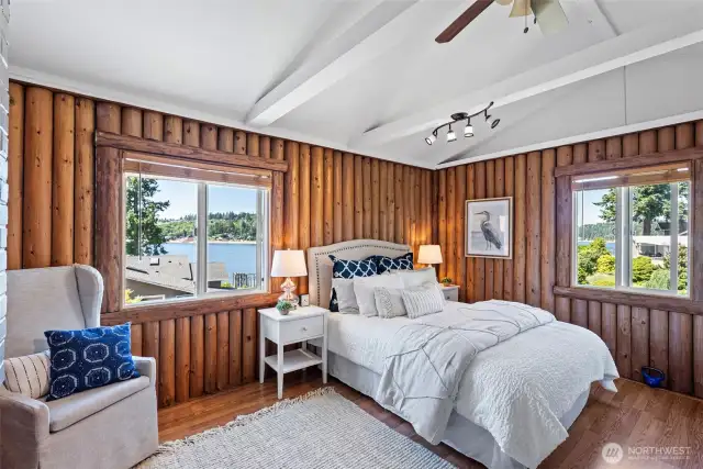 Always light and airy in the Primary bedroom with vaulted ceiling and fan to distribute the air.
