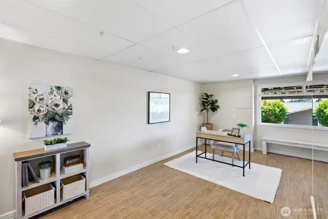 An additional finished space off the main entry bonus room is perfect as office, for guests, or home business.