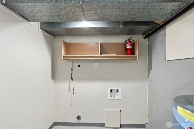 Looking at other end of mechanical room on lower level. Washer and Dryer ready for any style you prefer.