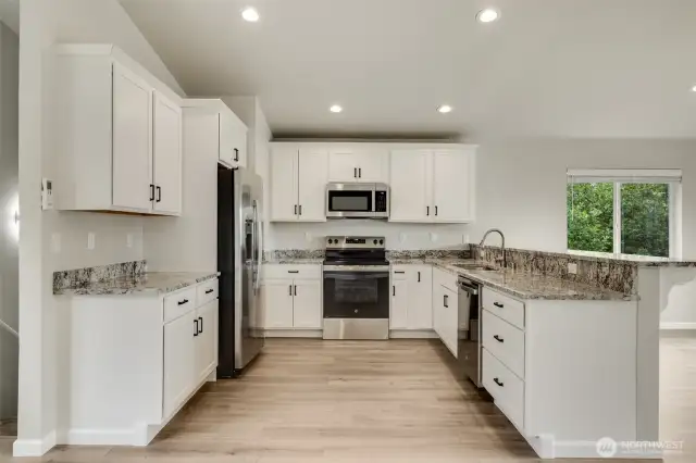 Quality cabinetry with granite countertops too!