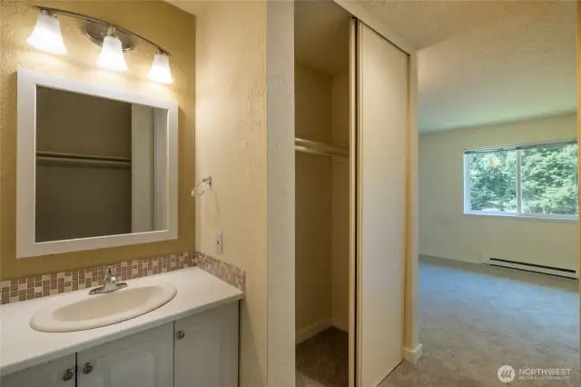 Lighted vanity with lots of under-counter storage.