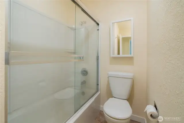 Full bath with shower and closet space.