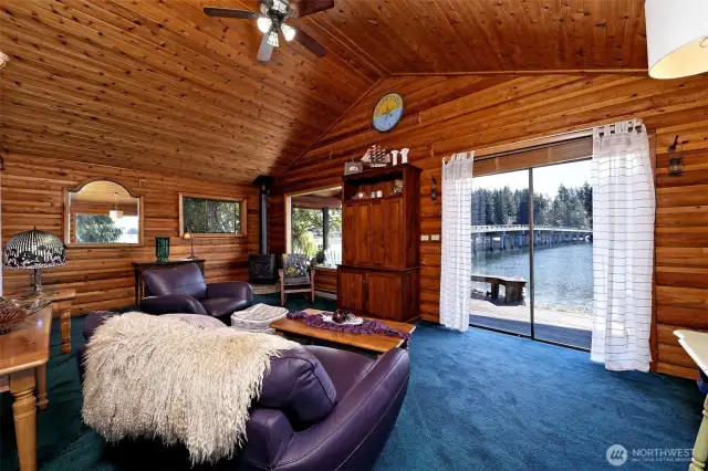 Living area with doors to the deck and beach.